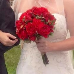 Bud's Flowers And Gifts - Bride bouquet and this photo does not do it justice!