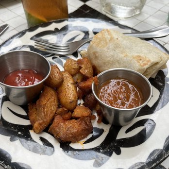 Domingo - Breakfast burrito. - Cocktail Bars Near Me - San Antonio, Texas