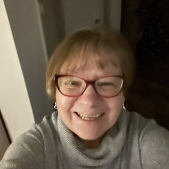 Nibbles - a woman with glasses smiling - Ice Cream & Frozen Yogurt Near Me - Roscommon, Michigan