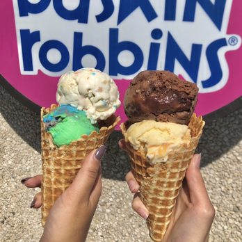 Baskin Robbins - two ice cream cones in front of a baskin robbins sign - Ice Cream & Frozen Yogurt Near Me - Mississauga, Ontario