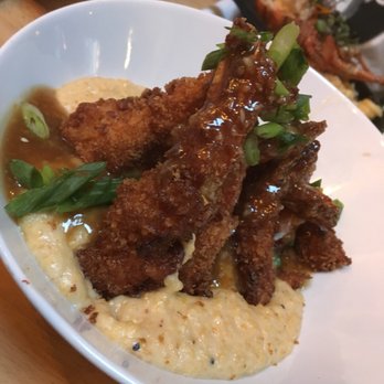 Scratch Kitchen & Taproom - Tempura Shrimp and grits. Not your average shrimp and grits. The ginger sauce over the shrimp and grits ruined this dish! - Bars Near Me - Apex, North Carolina