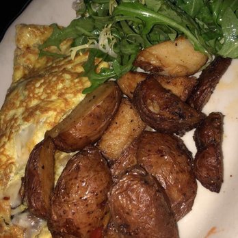 Rosebud Bar & Kitchen - Mushroom omelette with potatoes and greens - New American Near Me - Somerville, Massachusetts Rosebud Bar & Kitchen - Mushroom omelette with potatoes and greens - New American Near Me - Somerville, Massachusetts