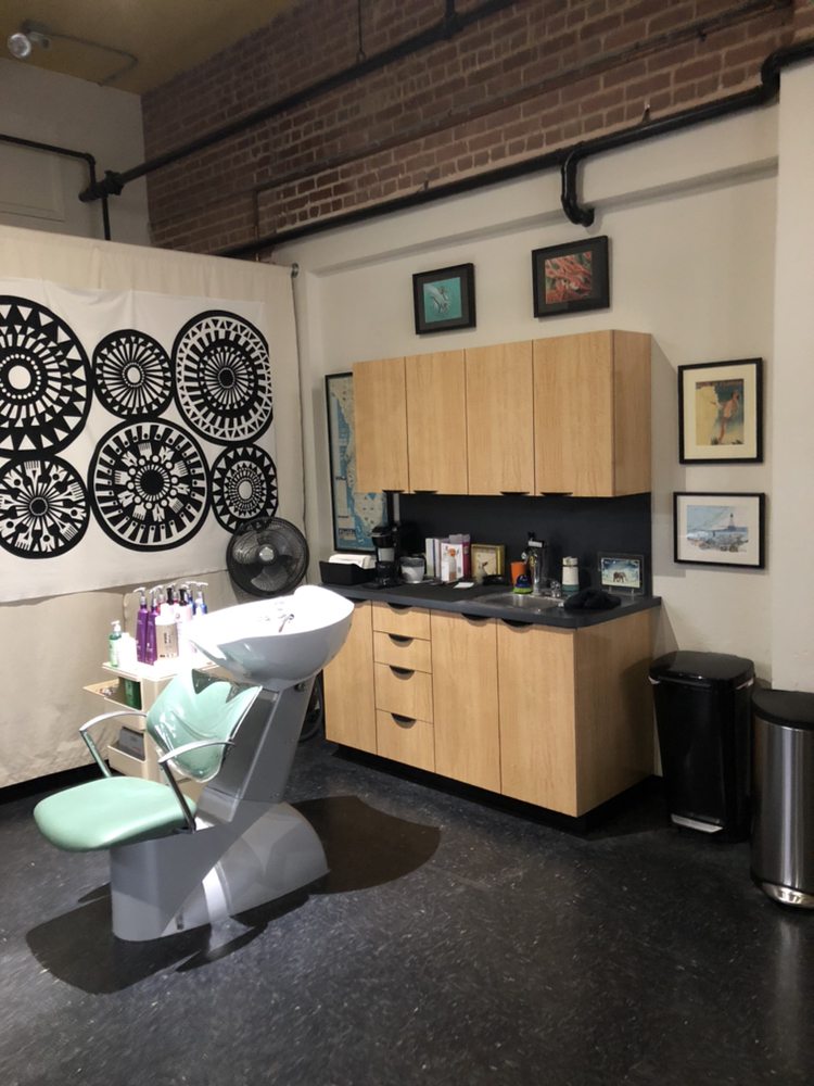 Rage Hair Design Logo