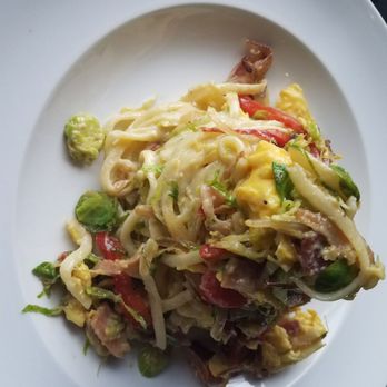 Dorsia - Breakfast Pasta is a perfect example of Dorsia's take on Reimagined Italian cuisine.  Think pasta carbonara meets an Italian omelet. - Italian Near Me - Milwaukee, Wisconsin