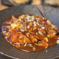 Crab meat tom yum lava bowl