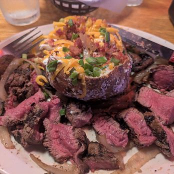 Texas Roadhouse - Baked potato with a smash of chives, bacon bits, sour cream, cheddar cheese and tender Dallas Filet. - Barbeque Near Me - Tracy, California Texas Roadhouse - Baked potato with a smash of chives, bacon bits, sour cream, cheddar cheese and tender Dallas Filet. - Barbeque Near Me - Tracy, California
