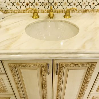 Cheryl Collins Signature Style - Custom Glazed Cabinetry with a Marble top with a fabulous backsplash. Custom faucets in Satin gold - Interior Design Near Me - Montgomery, Alabama Cheryl Collins Signature Style - Custom Glazed Cabinetry with a Marble top with a fabulous backsplash. Custom faucets in Satin gold - Interior Design Near Me - Montgomery, Alabama