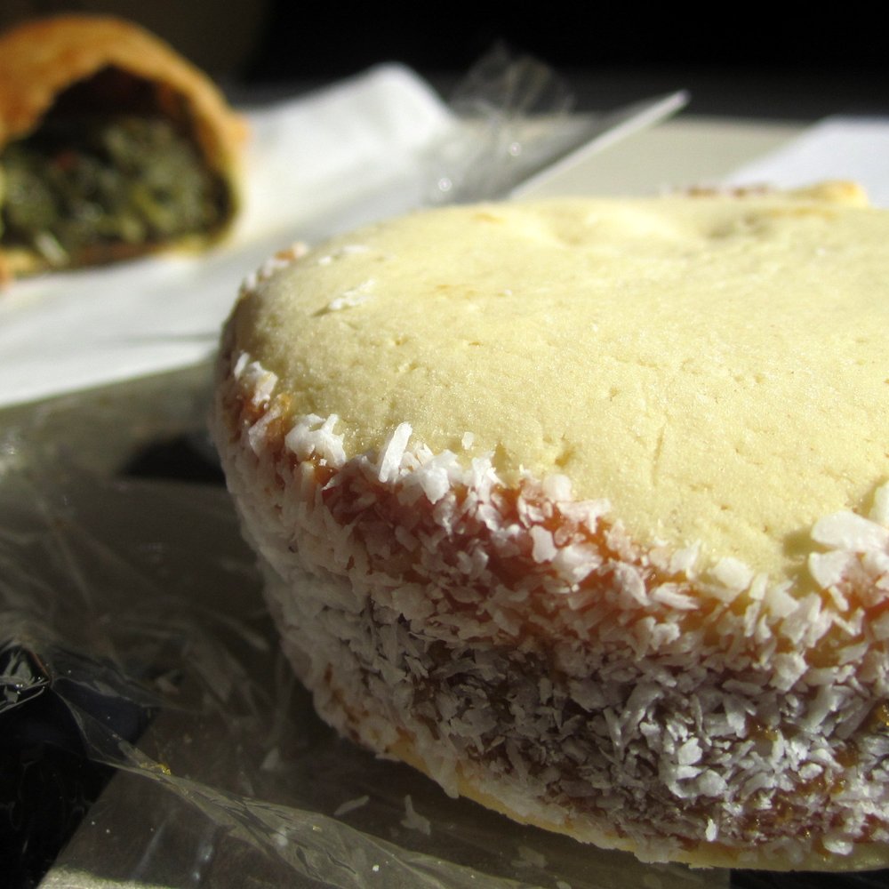 Fantastic alfajor and spinach empanada in the background.