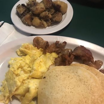 Hate Mondays Tavern - 2 eggs with pancakes house potatoes bacon - Barbeque Near Me - Miami, Florida