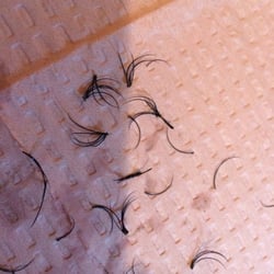 Modern Nails & Lashes - Clusters of lashes that were attached to my natural lashes