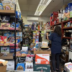 Sue's Mini Mart - This is Sue , when you glance through the small window