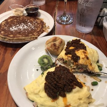 The Basics - Special Omelet packed with veggies and topped with a sun dried tomato pesto - really delicious! The biscuit and pancake were awesome too :) - Southern Near Me - Wilmington, North Carolina