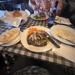 Giovanni's Italian Eatery - Ribeyes, shrimp scampi, fresh roll, portobello mushroom ravioli.