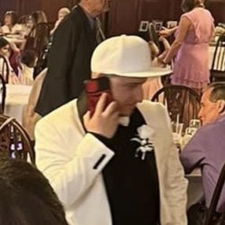 Happily Ever After - Was on the phone for more than half of the wedding. Proof is in the picture.