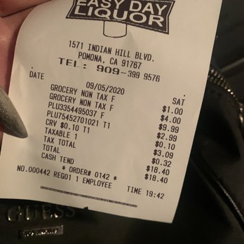 Easy Day Liquor - a hand holding a receipt - Beer, Wine & Spirits Near Me - Pomona, California