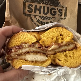 Shug's Bagels - Russian- Egg Everything Bagel, Chicken Cutlet, Bacon, Muenster, Russian Dressing, and Salt - Sandwiches Near Me - Dallas, Texas Shug's Bagels - Russian- Egg Everything Bagel, Chicken Cutlet, Bacon, Muenster, Russian Dressing, and Salt - Sandwiches Near Me - Dallas, Texas