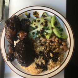 Bodega Aguila Real - Chicken in Mole with Chayote, Rice and Beans offered occasonally on Wednesdays
