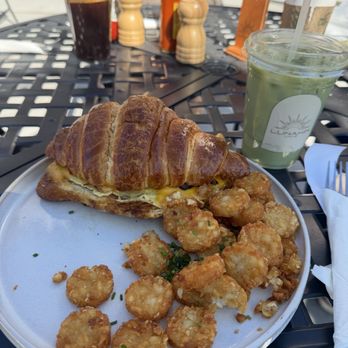 Lunakin Café - breakfast croissant with bacon and potatoes ($16) - Breakfast & Brunch Near Me - Las Vegas, Nevada
