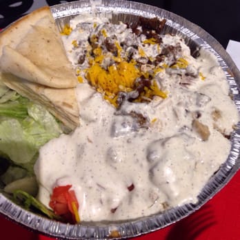 The Halal Guys - See, she don't play with the extra white sauce. Combo platter. Hot sauce on the side. - Halal Near Me - Costa Mesa, California The Halal Guys - See, she don't play with the extra white sauce. Combo platter. Hot sauce on the side. - Halal Near Me - Costa Mesa, California