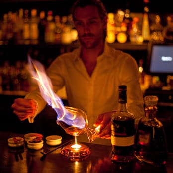 Eau de Vie - Mixologist making a Blazer. Image courtesy of Eau De View (Used with permission) - Wine Bars Near Me - Darlinghurst, NSW