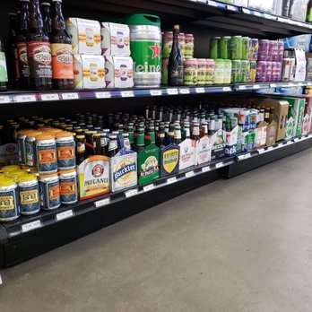 Chambers Wines & Liquors - They keep the entire bottom row stocked with a wide variety of non-alcoholic beers. - Beer, Wine & Spirits Near Me - Aurora, Colorado Chambers Wines & Liquors - They keep the entire bottom row stocked with a wide variety of non-alcoholic beers. - Beer, Wine & Spirits Near Me - Aurora, Colorado