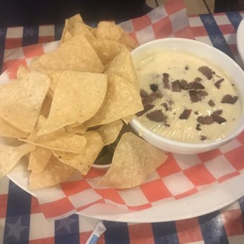 T-Bone Tom's - Brisket queso (chips are some of the best) - Barbeque Near Me - Kemah, Texas