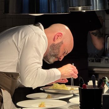 Wild Common - Chef doing his magic! - New American Near Me - Charleston, South Carolina