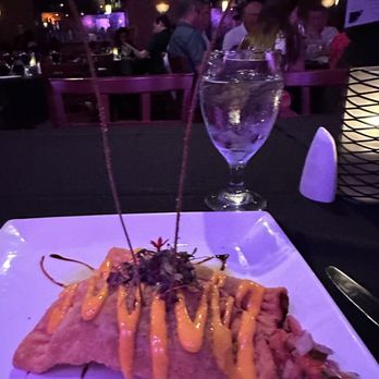 Selva Grill - a plate of food and a glass of water - Spanish Near Me - Sarasota, Florida Selva Grill - a plate of food and a glass of water - Spanish Near Me - Sarasota, Florida