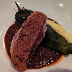 Bonda Restaurant - ​pan roasted duck breast, roasted poblano stuffed with polenta, molé sauce