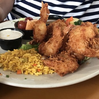 Gramma Dot's - Coconut shrimp. Crispy and cooked to perfection! The pineapple marmalade dipping sauce compliments it rather well! - Seafood Near Me - Sanibel, Florida