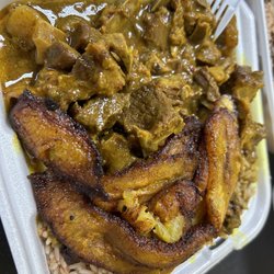 Goat stew with plantains and rice