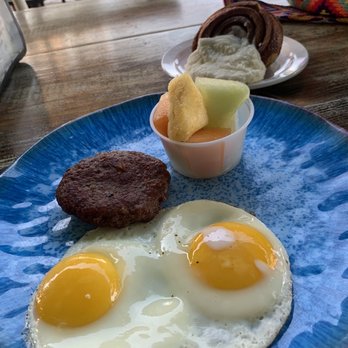 The Sticky Bun - Eggs and sausage w/ cinnamon roll - Breakfast & Brunch Near Me - Deerfield Beach, Florida