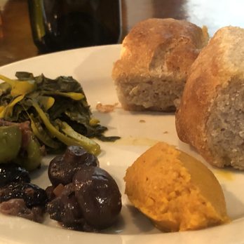 Millennium - Amuse Bouche of house-made focaccia with carrot butter, pickled gai lan, and wine marinated mushrooms and olives. - Vegan Near Me - Oakland, California Millennium - Amuse Bouche of house-made focaccia with carrot butter, pickled gai lan, and wine marinated mushrooms and olives. - Vegan Near Me - Oakland, California