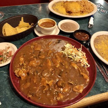 La Costa Restaurant - Arroz con Pollo with added spice :) (chicken enchiladas with rice and beans in the background) - Mexican Near Me - Burien, Washington