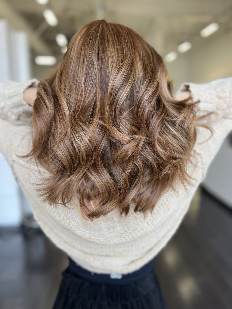 Courtney at Cristophe Salon Logo