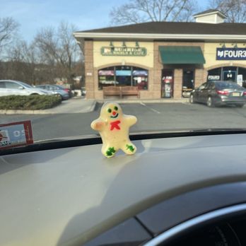 Sunrise Bagels & Cafe - a toy on the dashboard of a car - Bagels Near Me - Wyckoff, New Jersey