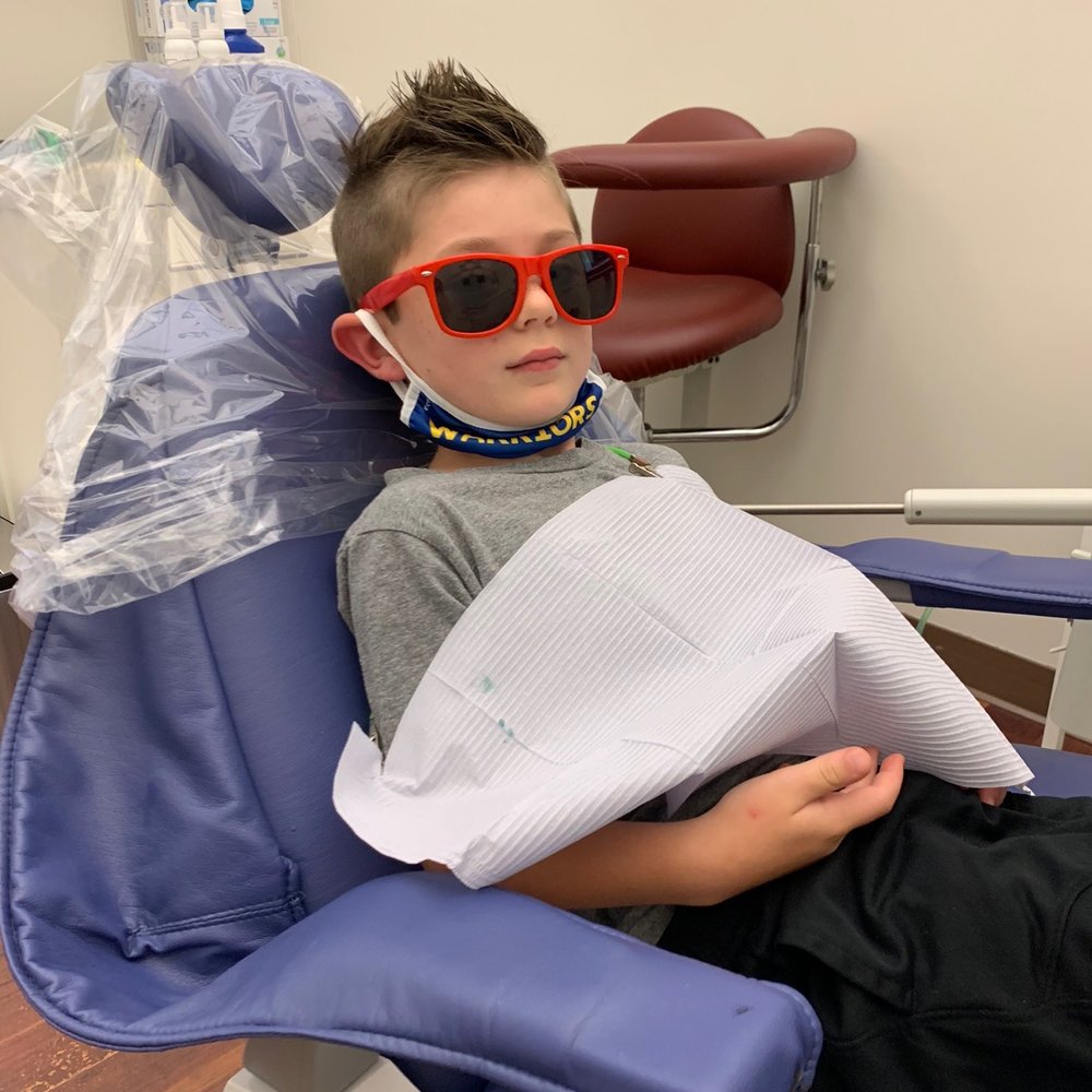 My son in the shades Dr. Abrams gave him for a cleaning. My son in the shades Dr. Abrams gave him for a cleaning.