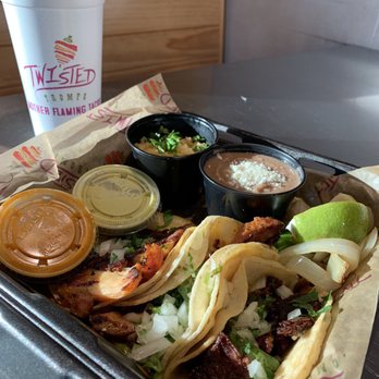 Twisted Trompo - 3 taco plate with rice and beans, and 24 ounce fountain drink. $7.99. On taco Tuesday after 4 PM only $4.99!! - Mexican Near Me - Garland, Texas Twisted Trompo - 3 taco plate with rice and beans, and 24 ounce fountain drink. $7.99. On taco Tuesday after 4 PM only $4.99!! - Mexican Near Me - Garland, Texas