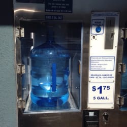 The Water Jug - $1.75 per 5 gallon jug or $0.35 per gallon if you have smaller bottles.