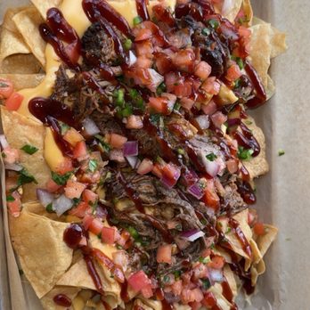Keg & Cow - Macho Nachos subbed the pork for brisket - American Near Me - Cape Coral, Florida