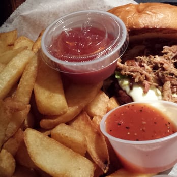 Olde Magoun's Saloon - The Hillbilly with fries (Burger topped with pulled pork, coleslaw, American cheese with red pepper vinegar sauce on the side) - Irish Near Me - Somerville, Massachusetts Olde Magoun's Saloon - The Hillbilly with fries (Burger topped with pulled pork, coleslaw, American cheese with red pepper vinegar sauce on the side) - Irish Near Me - Somerville, Massachusetts