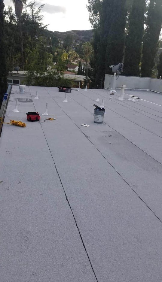 Slide of Rex Roofing