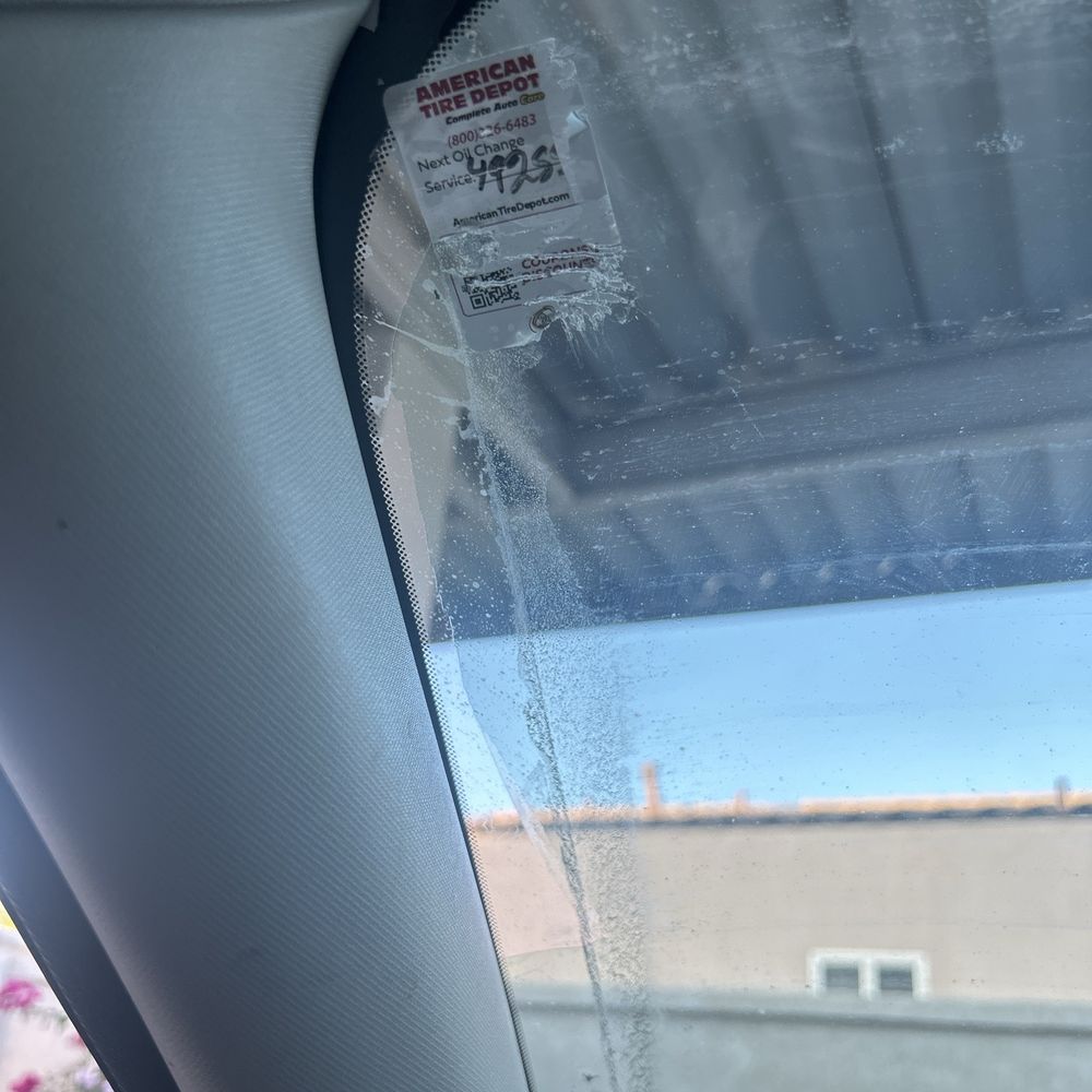American Tire Depot - Ripped Tint on front windshield - Auto Repair Near Me - La Quinta, California
