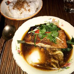 Frank and Connies Kitchen - Seared barramundi in a crab broth with greens and a side of coconut rice.
