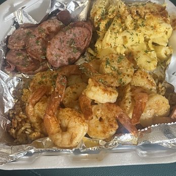 Geechie Garlic Crabs & Seafood - Shrimp dinner with crab rice, beef sausage & mac n cheese - Seafood Near Me - Hanahan, South Carolina Geechie Garlic Crabs & Seafood - Shrimp dinner with crab rice, beef sausage & mac n cheese - Seafood Near Me - Hanahan, South Carolina