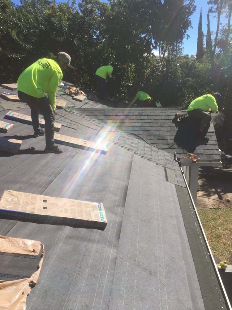 Slide of Valley Isle Roofing