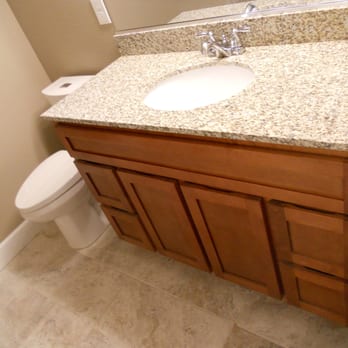 RT Basement Finishing - a sink and toilet in a bathroom - General Contractors Near Me RT Basement Finishing - a sink and toilet in a bathroom - General Contractors Near Me
