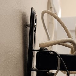 The Hotel Jacaranda - TV bracket coming off wall. Room 226
