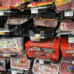 Kroger - OPEN bacon turning brown 2nd shelf down on left.