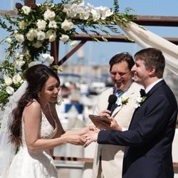 Cristina's Flowers - Ceremony arch bouquet and boutonnières